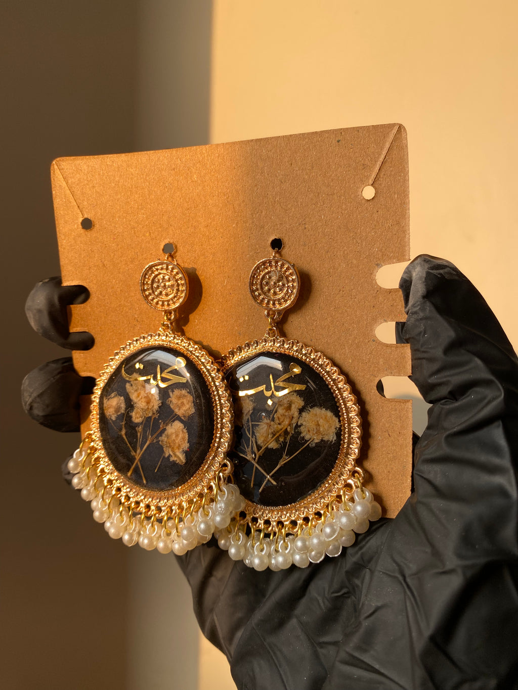 Black Resin Pearl Jhumkas