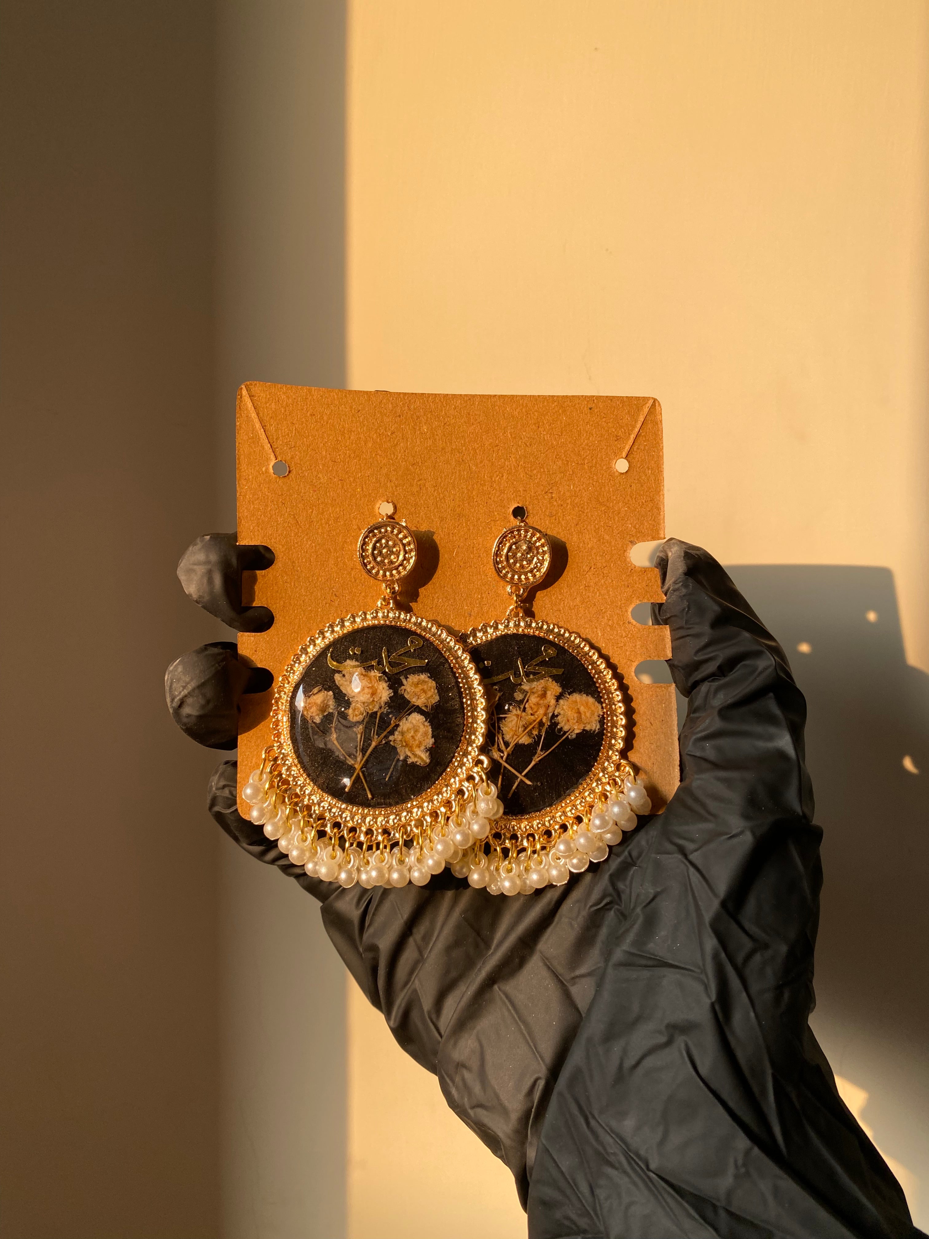 Black Resin Pearl Jhumkas